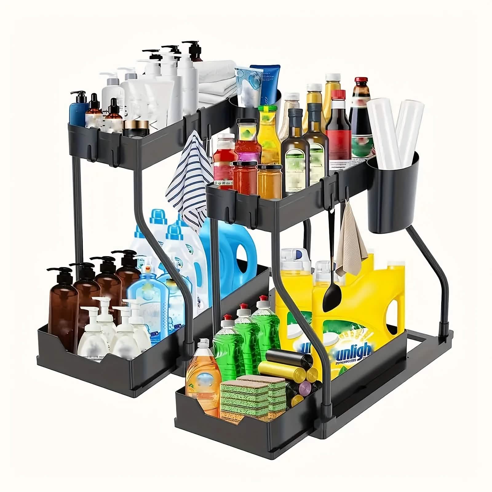 Under sink organizer sliding shelves pulled out around plumbing